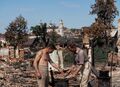 Солдаты вермахта готовят еду среди руин на возвышенности напротив современного мединститута. Вдали Костёл святого Антония. Июль–август 1941 года